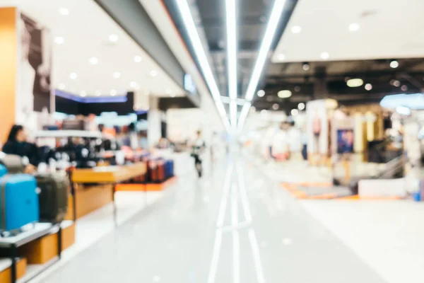 Abstract blur and bokeh defocused shopping mall interior of depa — Stock Photo, Image