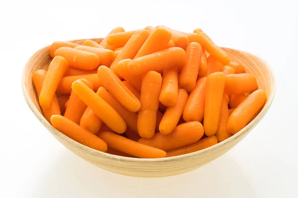 Baby carrot in wooden bowl — Stock Photo, Image