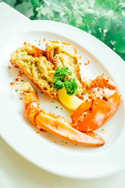 Grilled lobster with butter and garlic — Stock Photo, Image