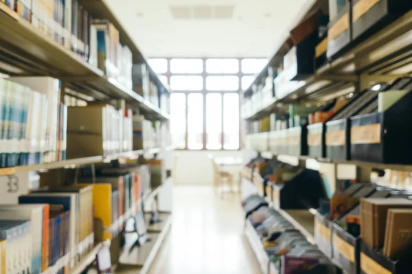 Abstract blur and defocused bookshelf in library