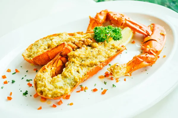 Grilled lobster with butter and garlic — Stock Photo, Image