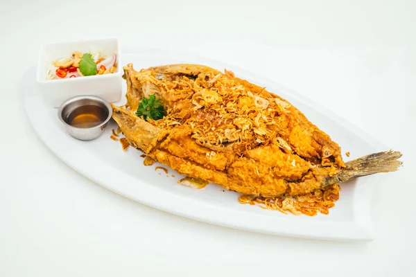 Fried sea bass meat fish with sauce — Stock Photo, Image