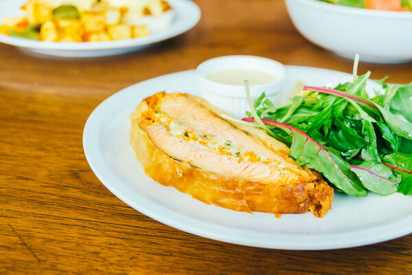 Salmon steak in white plate