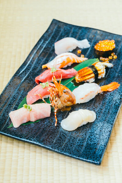 Raw and fresh salmon tuna shrimp and other sushi