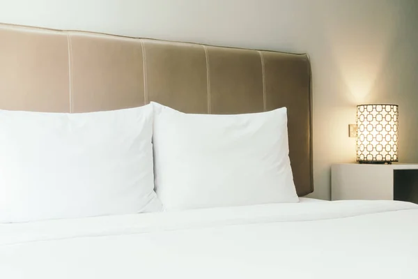 White pillow on bed — Stock Photo, Image