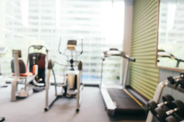 Equipo de fitness abstracto desenfoque en el gimnasio —  Fotos de Stock