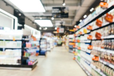 Soyut bulanıklık ve süpermarkette alışveriş bölümü s defocused