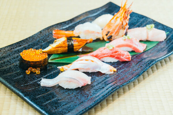 Raw and fresh salmon tuna shrimp and other sushi