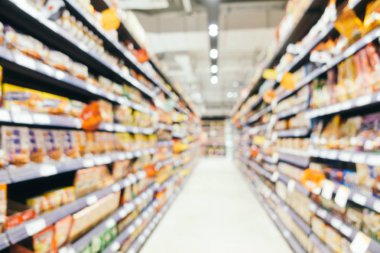 Soyut bulanıklık ve süpermarkette alışveriş bölümü s defocused