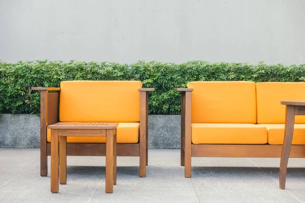 Wooden sofa and chair — Stock Photo, Image