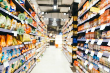 Soyut bulanıklık ve süpermarkette alışveriş bölümü s defocused