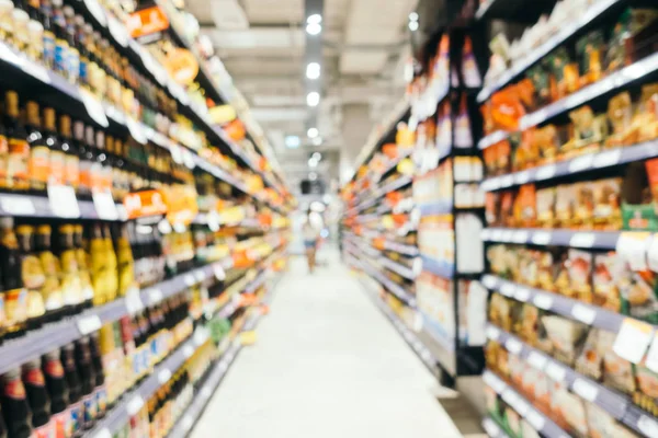 Soyut bulanıklık ve süpermarkette alışveriş bölümü s defocused