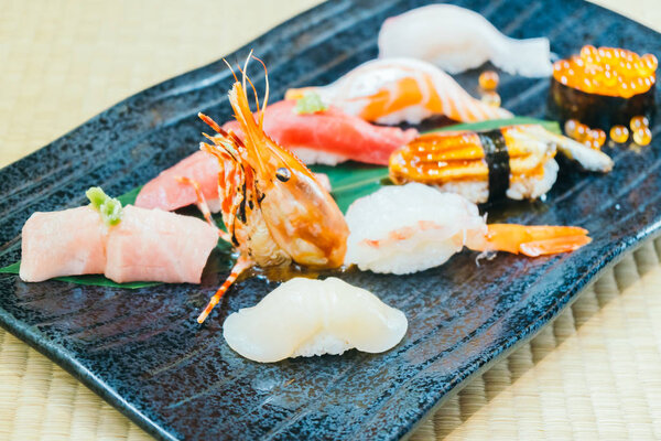 Raw and fresh salmon tuna shrimp and other sushi