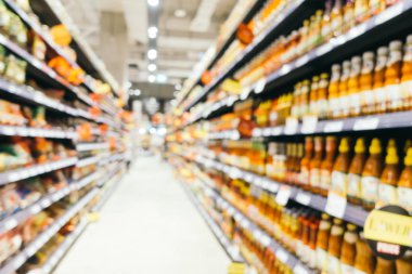 Soyut bulanıklık ve süpermarkette alışveriş bölümü s defocused