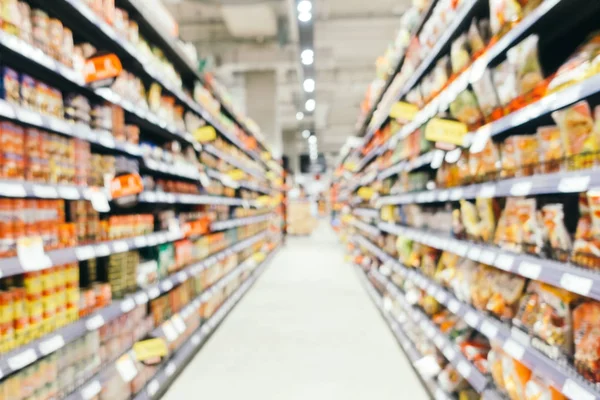 Soyut bulanıklık ve süpermarkette alışveriş bölümü s defocused