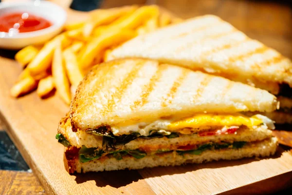 Club sandwich with french fries — Stock Photo, Image