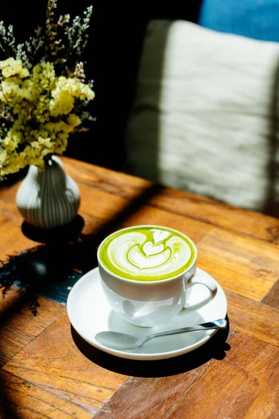 Green tea matcha latte in white cup — Stock Photo, Image