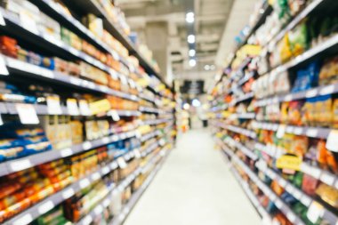 Soyut bulanıklık ve süpermarkette alışveriş bölümü s defocused