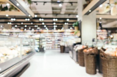 Soyut bulanıklık ve süpermarkette alışveriş bölümü s defocused