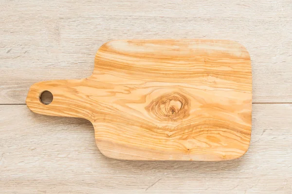 コピー スペースを持つ木製の背景の木まな板 — ストック写真