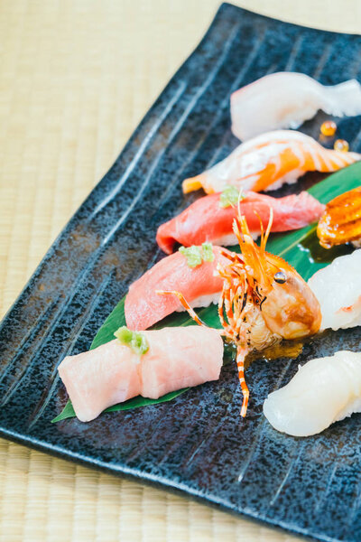 Mixed Raw and fresh salmon tuna shrimp and other sushi - Japanese food style