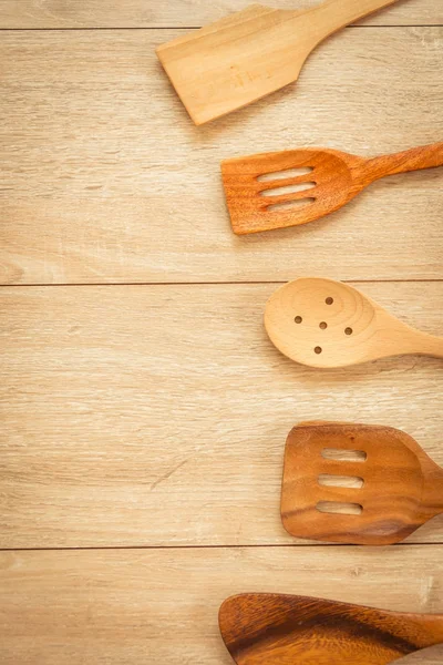 Wood utensils or kitchen ware on wooden table with copy space - Vintage Filter