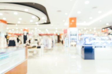Arkaplan için mağaza içindeki soyut bulanıklık ve odaklanmış alışveriş merkezleri