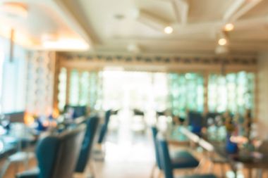 Arka plan için soyut bulanıklık ve odaklanmış kahve dükkanı ve restoran iç mekanı