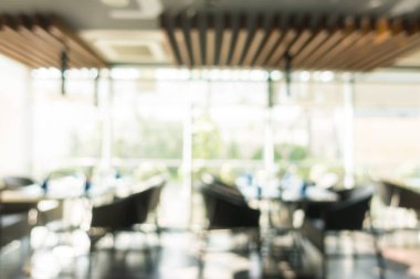 Arka plan için soyut bulanıklık ve odaklanmış kahve dükkanı ve restoran iç mekanı