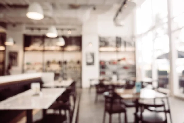 Abstract blur and defocused restaurant interior for background - Vintage light Filter