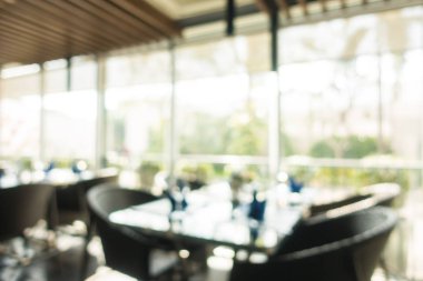 Arka plan için soyut bulanıklık ve odaklanmış kahve dükkanı ve restoran iç mekanı