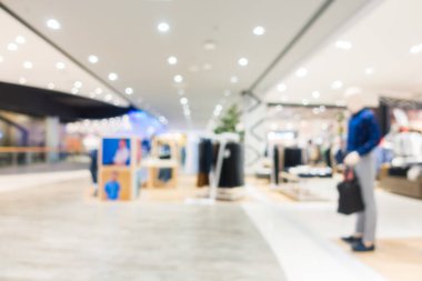 Arkaplan için mağaza içindeki soyut bulanıklık ve odaklanmış alışveriş merkezleri