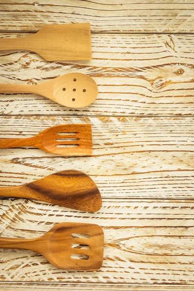 Wood utensils or kitchen ware on wooden table with copy space - Vintage Filter