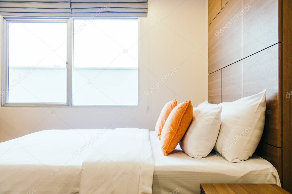 Comfortable pillow on bed decoration interior of hotel room