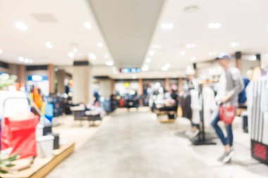 Arkaplan için mağaza içindeki soyut bulanıklık ve odaklanmış alışveriş merkezleri