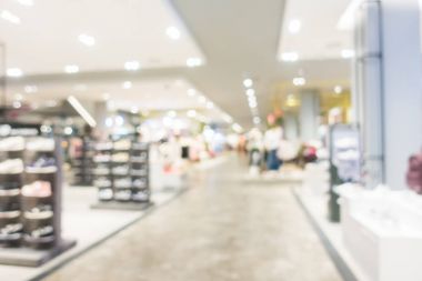 Arkaplan için mağaza içindeki soyut bulanıklık ve odaklanmış alışveriş merkezleri