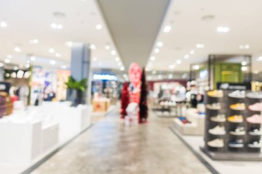 Arkaplan için mağaza içindeki soyut bulanıklık ve odaklanmış alışveriş merkezleri