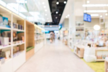 Arkaplan için mağaza içindeki soyut bulanıklık ve odaklanmış alışveriş merkezleri