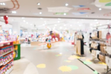 Arkaplan için mağaza içindeki soyut bulanıklık ve odaklanmış alışveriş merkezleri