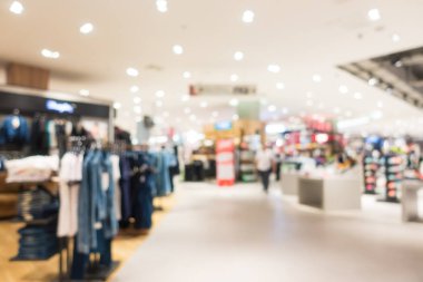 Arkaplan için mağaza içindeki soyut bulanıklık ve odaklanmış alışveriş merkezleri