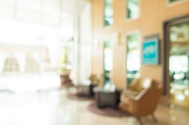 Arka plan için soyut bulanık otel ve lobi iç mimarisi