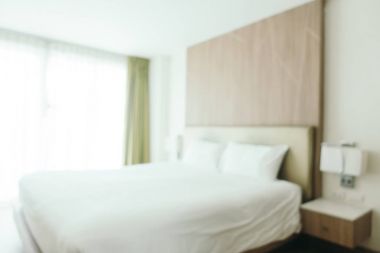 Soyut bulanıklık otel yatak odası iç arka plan için defocused