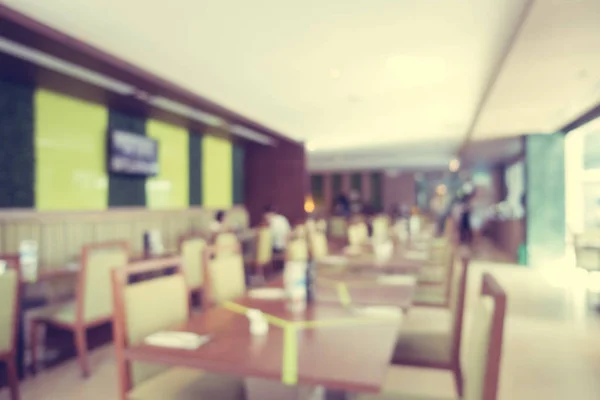 Abstract blur defocused restaurant and coffee shop interior for background - Vintage Filter