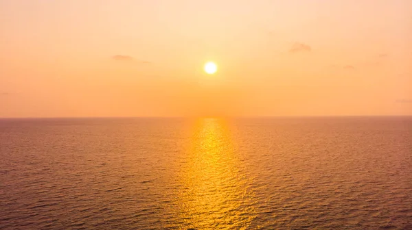 Sunset with sea on sky background — Stock Photo, Image