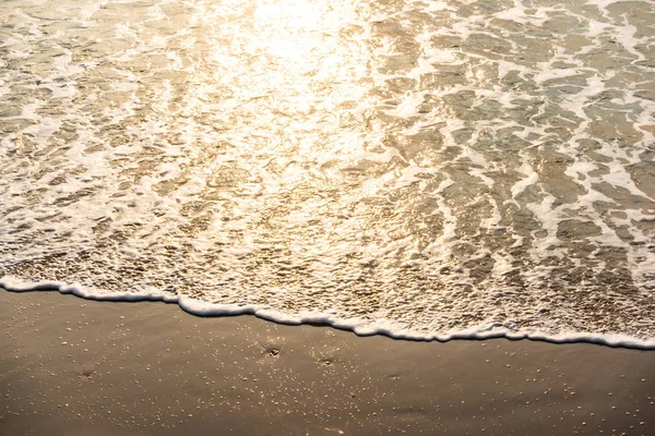 Sunset on the beach and sea — Stock Photo, Image