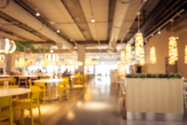 Arka plan için soyut bulanıklık ve odaklanmış kahve dükkanı ve restoran iç mekanı
