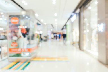 Arkaplan için mağaza içindeki soyut bulanıklık ve odaklanmış alışveriş merkezleri