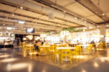 Arka plan için soyut bulanıklık ve odaklanmış kahve dükkanı ve restoran iç mekanı