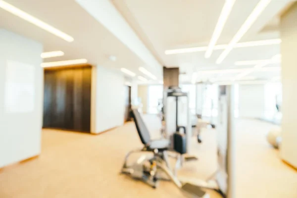 Abstract blur and defocused fitness equipment in gym interior