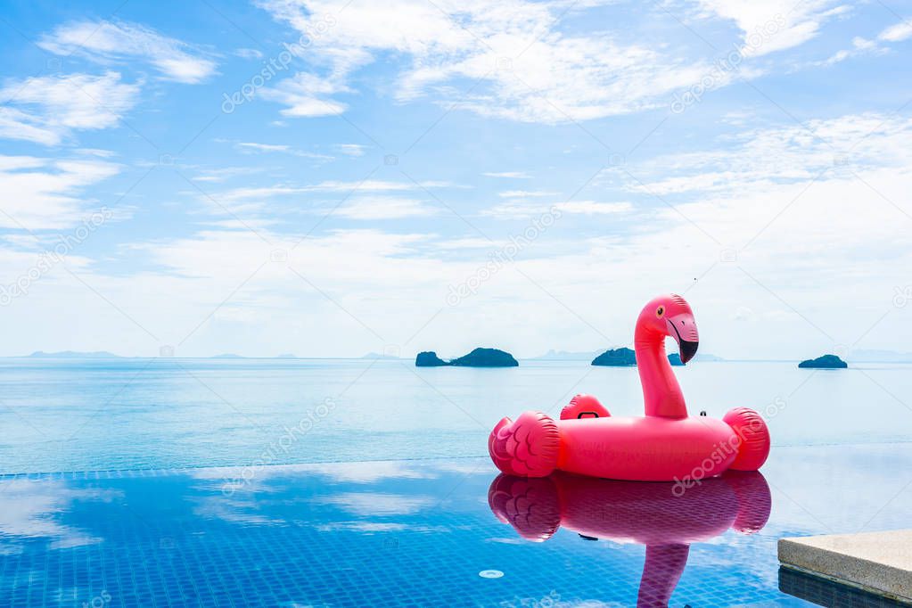 Beautiful outdoor swimming pool in hotel resort with flamingo fl